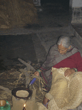 mujer cocinando en Lawani